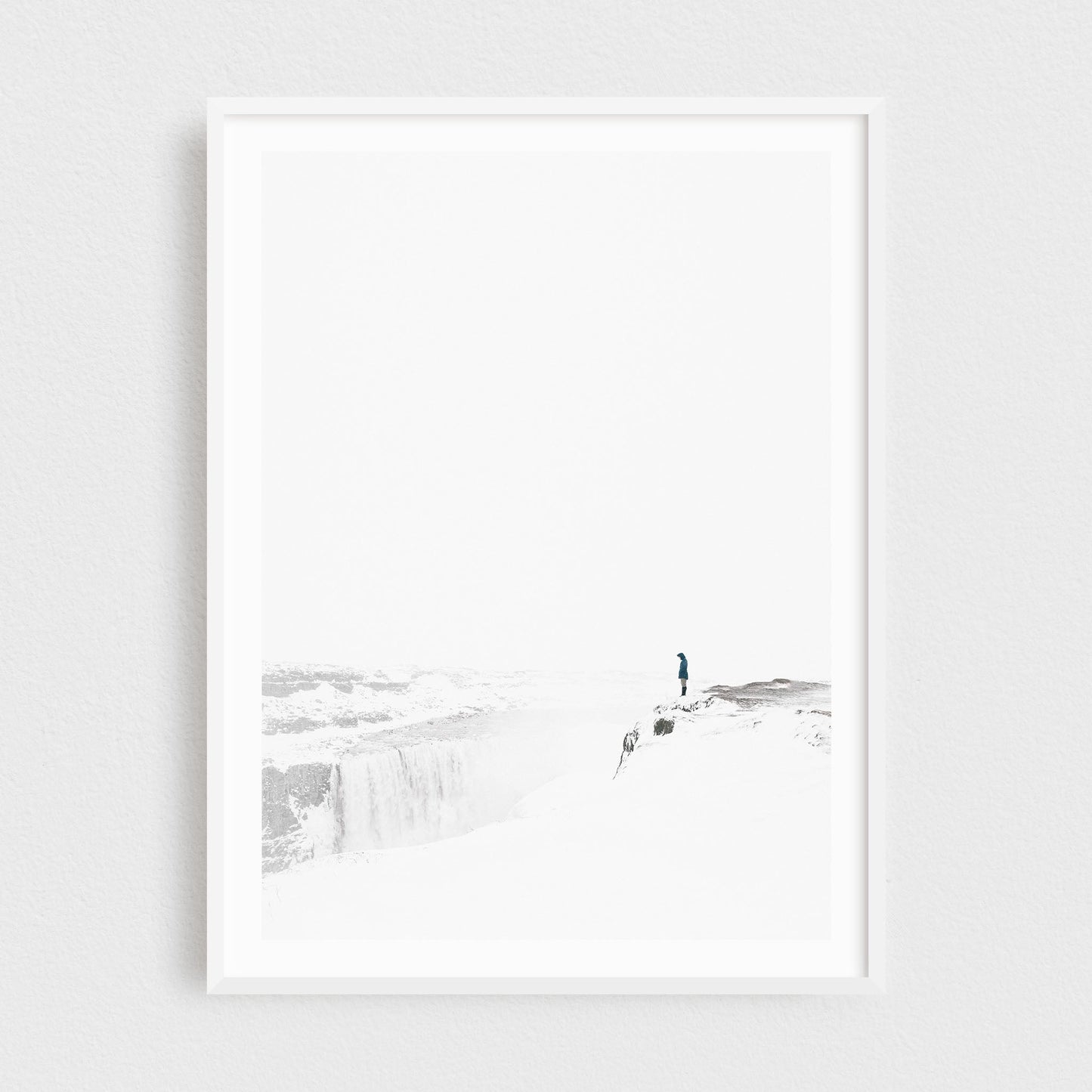 Iceland fine art photography print featuring Dettifoss waterfall in winter, in a white frame