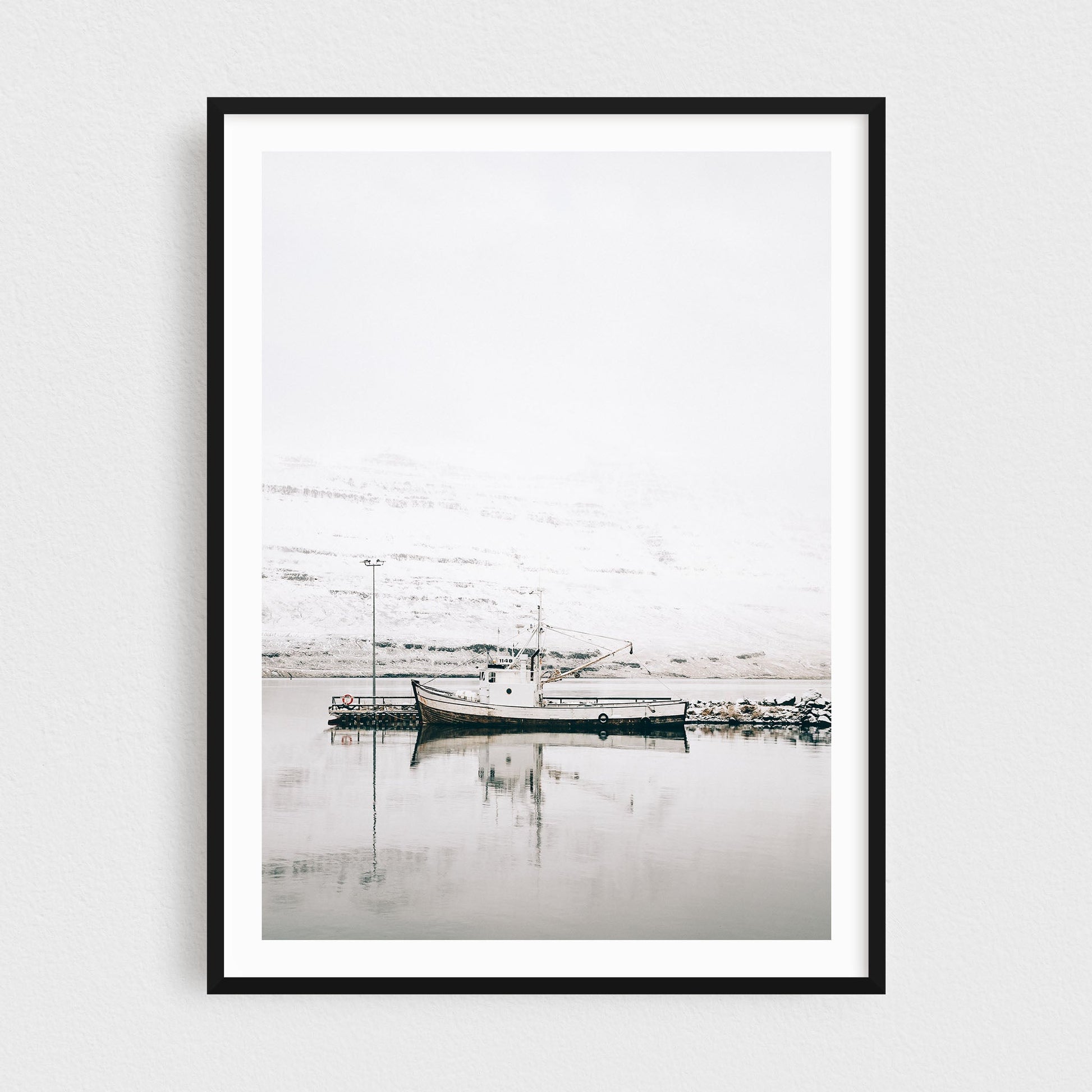 Iceland fine art photography print featuring Seydisfjordur fishing vessel in the fjord in winter
